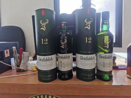 Polsek Pakal Ungkap Penjualan Miras Ilegal di Lakarsantri, Puluhan Botol Arak Bali Diamankan